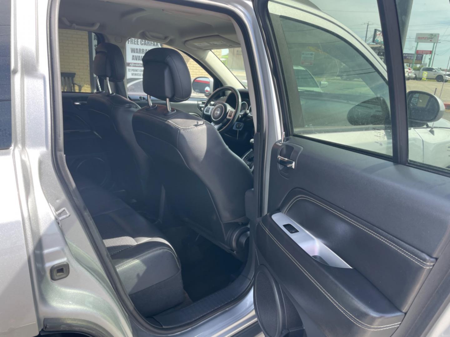 2016 Silver Jeep Compass (1C4NJCEA4GD) with an 4-Cyl, 2.0 Liter engine, Automatic, CVT transmission, located at 8008 Warden Rd, Sherwood, AR, 72120, (501) 801-6100, 34.830078, -92.186684 - Photo#9